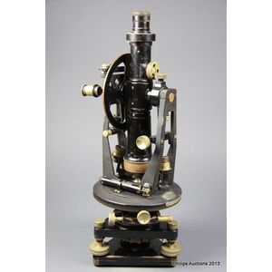 A surveyor's transit, with case and stand, first half 20th…