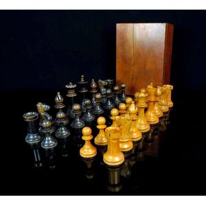 A Staunton design boxwood weighted chess set, c.1900, likely…