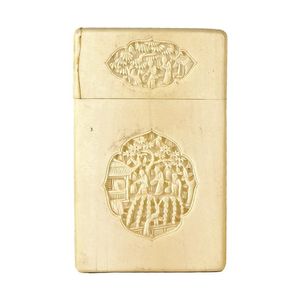 A carved ivory card case, one side carved with two leaf shaped…