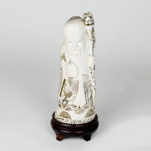 A Chinese ivory figure of Shou Lao, he stands wearing highly&hellip;