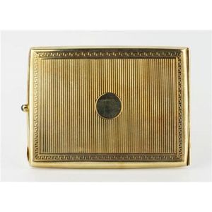 A 14ct gold cigarette case; 94 x 73 mm guilloche case with…
