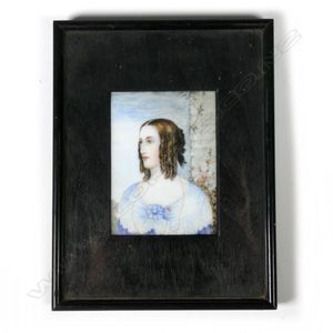 A portrait miniature on milk glass, of a Victorian woman,…