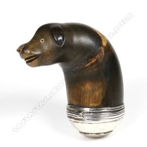 A 19th century horn snuff mull, the terminal in the form of a…