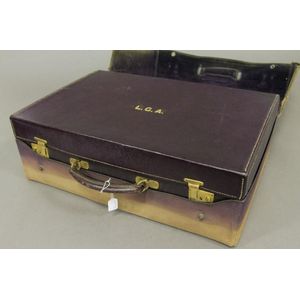 A vintage gentleman's Morrocan leather suitcase in deep…