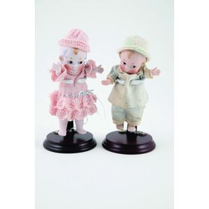 Two all bisque German kewpie dolls, dress as boy and girl, the…