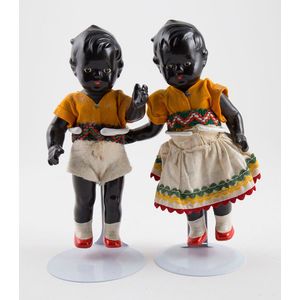 Pair unmarked all black composition dolls moulded and painted…