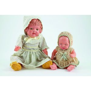 Pair made in Japan celluloid character toddler dolls, boy has…