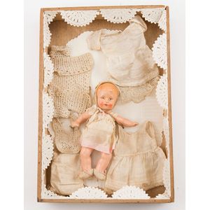 All composition baby doll painted features with display showing…