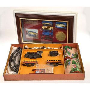 Clockwork train set with mixed parts, including Bing and Hornby;…