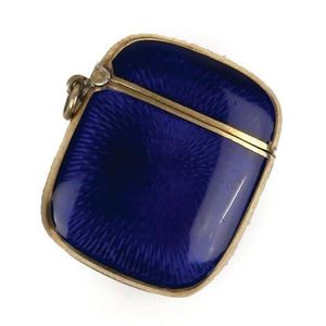 A silver and emamel vesta case, cobalt blue enamel to both…