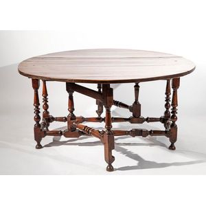 Early 18th century oak oval gateleg dining table, on tapering…