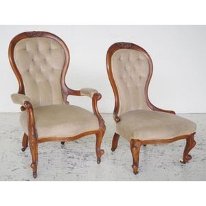 Antique grandmother store and grandfather chairs