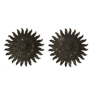 A pair of cast iron sunburst design medallions, converted to…
