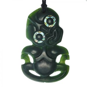 A superfine Kahurangi pounamu hei tiki, meticulously carved…