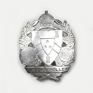 A 19th century silver cap badge for King's College (Auckland),…
