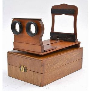 Cased early 20th century foldable stereoscope viewer