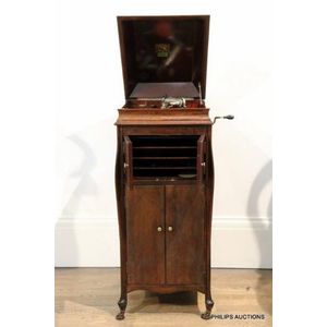 An HMV 'Studio Grand No 2' cabinet gramophone with records,…