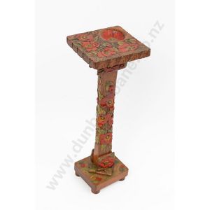 Jane Brenkley carved stand, profusely embellished with floral…