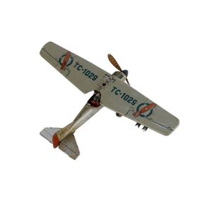 Tippco lithographed tinplate aeroplane. Monoplane clockwork…