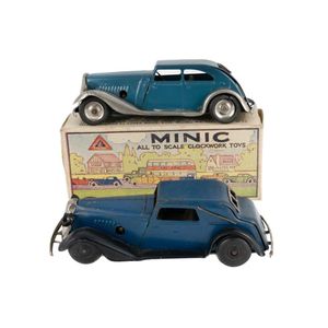 2 various Tri-ang Minic clockwork cars. One a sedan, light blue…