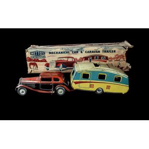 Mettoy mechanical car and trailer tinplate toy. Lithographed…