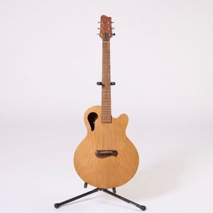 A Tacoma Chief C1C Acoustic Guitar. Serial No. B1615060. An…