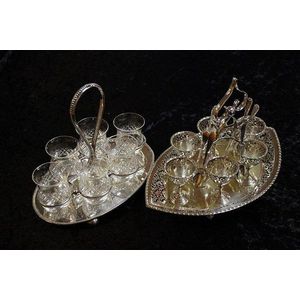 Silver plated egg cruet together with a glasses tray with 6…