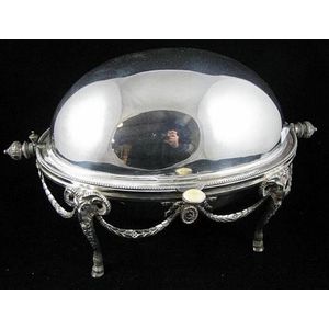 An antique ornate silver plated breakfast egg decorated with…