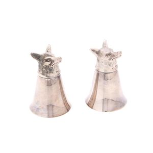 A cased pair of silverplated fox Hunt fox head stirrup cups by…