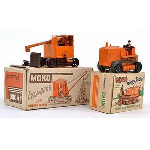 Matchbox Moko excavator, tracks missing, some paint loss; and…