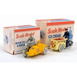 Two limited edition Mica re-issue diecast models, including…