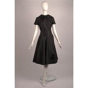 A black cocktail dress with Cowl neck and Sequin Braid detail&hellip;