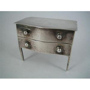 A silver 'dressing table' style stamp box with flat hinged…