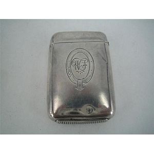 An Edwardian match case, plain rectangular with initialled belt…