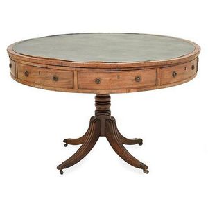 A 19th century, mahogany drum table on four scroll legs, circa…