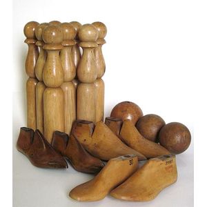 A set of eight French fruitwood Skittles three treen Balls and…