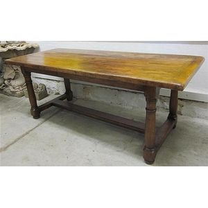 A French fruitwood farmhouse table with plank top turned legs…