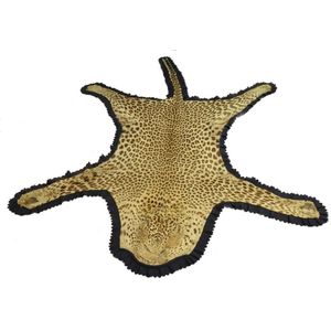 A leopard skin rug mounted by Army and C.S. Ltd London…