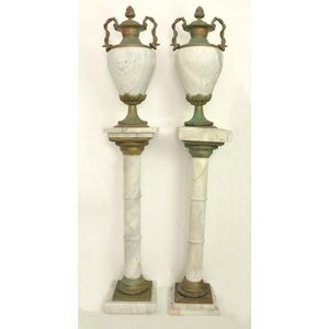 A pair of white marble and cast iron urns and pedestal urns 71…