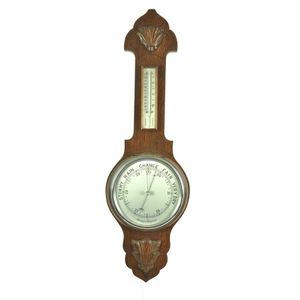 An oak framed wall barometer and thermometer, English, first…