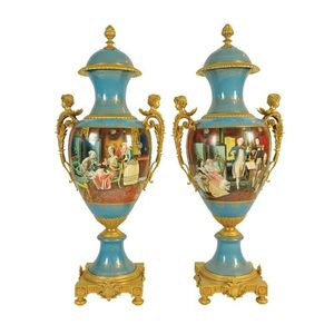 A pair of monumental painted porcelain and gilt bronze mounted…