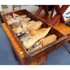 A Redfern shoe factory tray, containing original shoe lasts