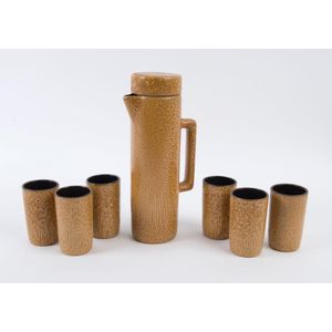 Gunda Pottery seven piece drink set, engraved 'Gunda, 27 cm high