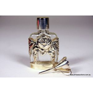 A sterling silver Clad perfume bottle with funnel, 1990 London,&hellip;