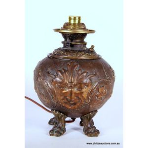 A bold Art Nouveau copper and bronze ball lamp, circa 1900, the…