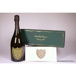 A boxed bottle of CUVEE Dom PERIGNON champagne. Vintage: 1990,…