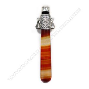 A Victorian silver and agate baby rattle, the silver top with…
