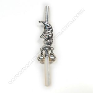 A silver and mother of pearl baby rattle, Mr. Punch to the…