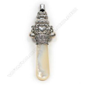An Edwardian silver and mother of pearl baby rattle, whistle to…