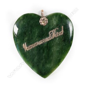 A large and impressive New Zealand pounamu heart pendant, with…